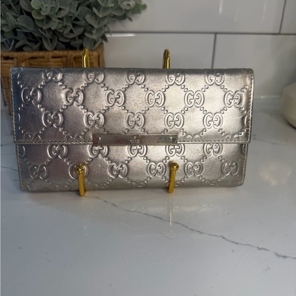 Gucci Handbags - Gucci Silver/goldish Embossed Wallet (project piece)